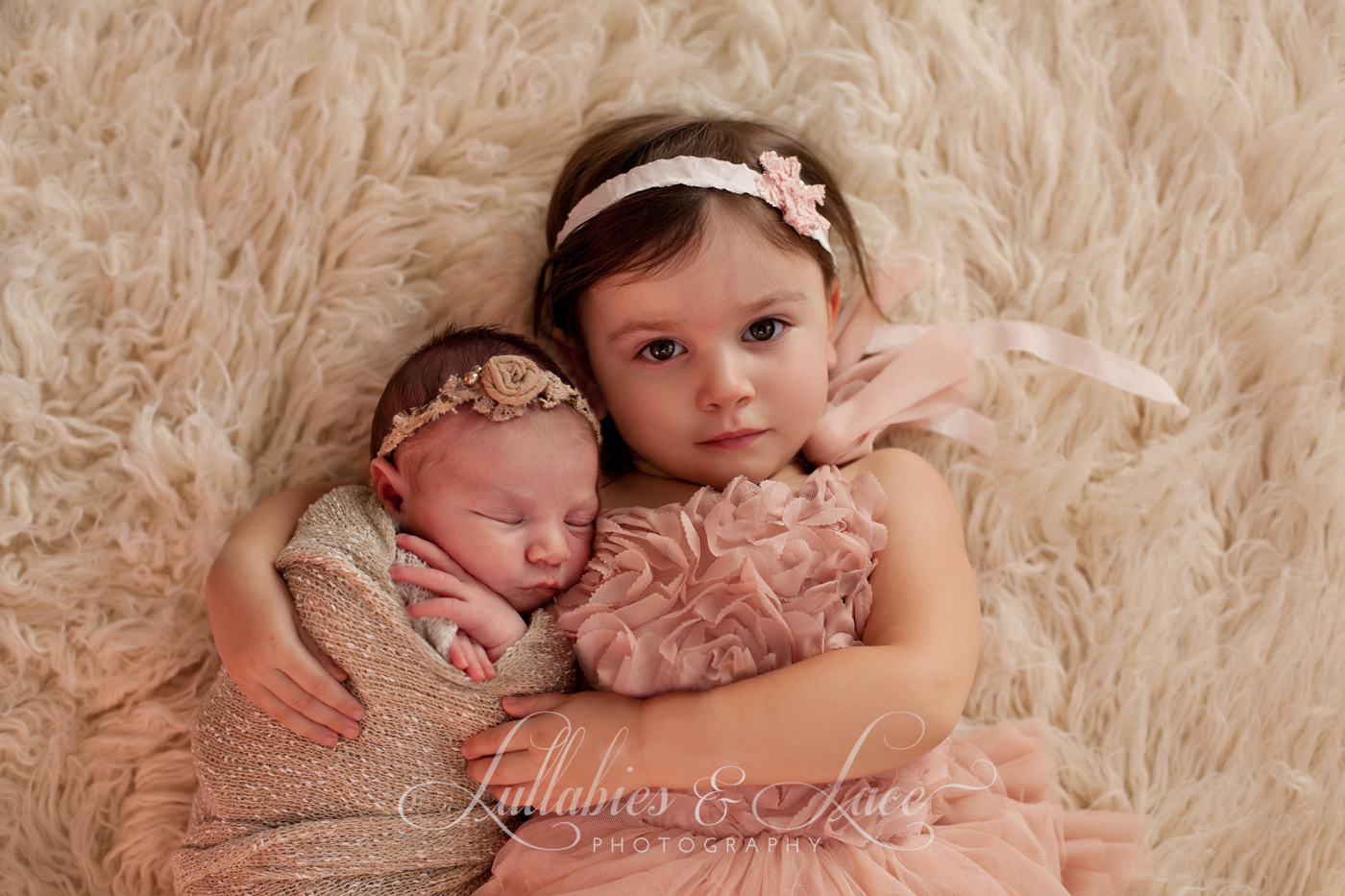 newborn with sister